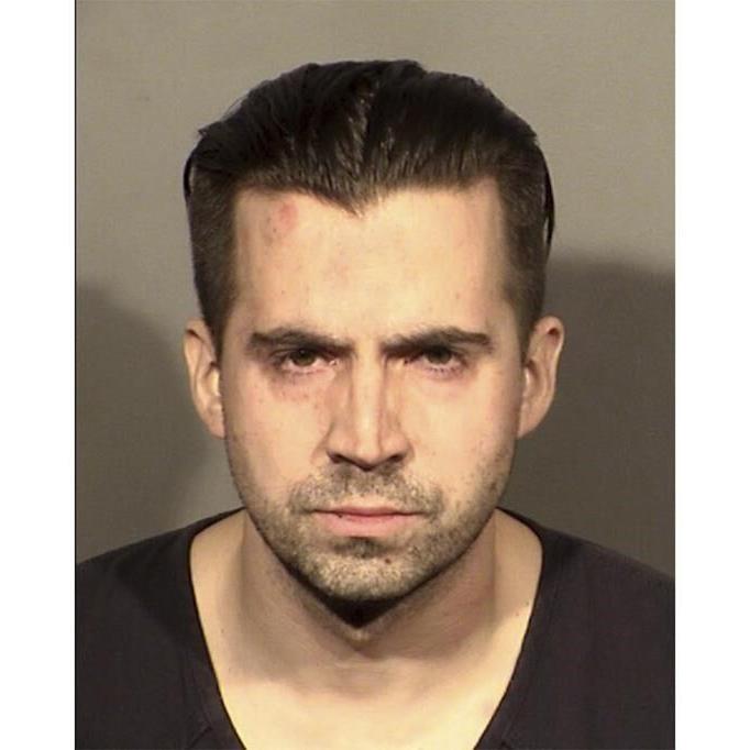 At trial of Las Vegas police officer, casino worker recalls thinking she might die in armed heist